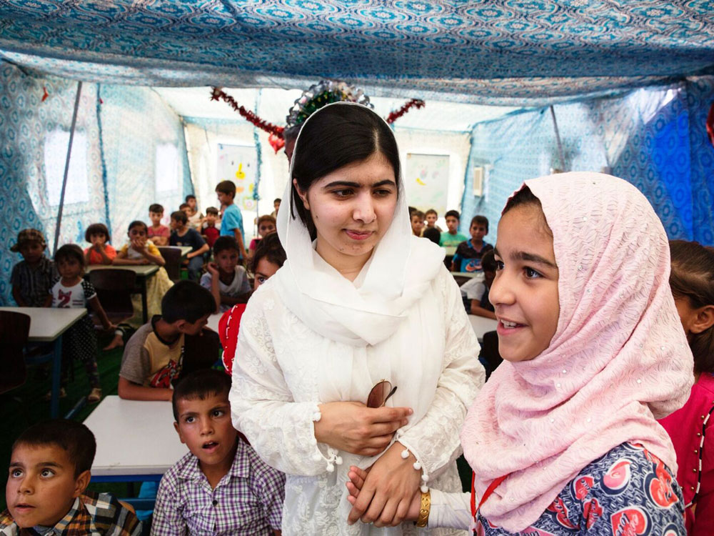 Malala Yousafzai with school children.